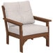 A POLYWOOD Vineyard teak deep seating chair with a white cushion.