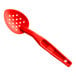 A close-up of a red Cambro Camwear perforated spoon.