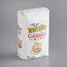 A white bag of White Lily Self-Rising Cornmeal Mix.