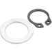 A metal ring and a pair of washers on a white background.