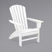 A white POLYWOOD adirondack chair with armrests.