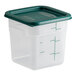 A Vigor translucent square plastic food storage container with a green lid.