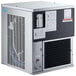 An air cooled Manitowoc nugget ice machine with a door open.