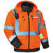 An orange Ergodyne GloWear safety jacket with reflective tape and a cell phone in the pocket.