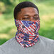 A man wearing an Ergodyne Stars and Stripes multi-band as a face covering.