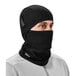 A man wearing a black Ergodyne N-Ferno fleece balaclava face mask.