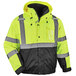 A yellow and black Ergodyne GloWear 8381 safety jacket with reflective stripes.