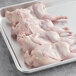 Manchester Farms whole quail on a tray.