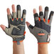 A pair of large Ergodyne heavy-duty work gloves with orange and black accents.