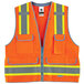 An orange Ergodyne heavy-duty surveyor vest with yellow and grey reflective stripes.