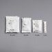 White packages of Multisorb NatraSorb desiccant packets with black text.