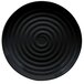 A black melamine plate with a spiral pattern in the center.