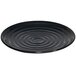 A black GET Milano melamine plate with ripples.