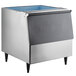 A galvanized steel Hoshizaki ice storage bin with a blue lid.