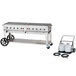 A large Crown Verity mobile outdoor grill with a cart and two wheels.