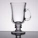 A Libbey clear glass coffee mug with a handle.