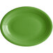 An oval green Acopa Capri stoneware platter with a rim.