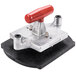 A red and black Vollrath Redco 6 section wedge plate on a counter.