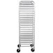 A silver metal Advance Tabco steam table pan rack with wheels.