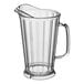 A clear plastic pitcher with a handle.