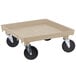 A beige Vollrath Traex rack dolly base with wheels.