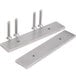 Two stainless steel metal plates with screws attached to them.