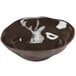 A brown Cal-Mil melamine bowl with a white rim.