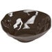 A black Cal-Mil melamine bowl with a white rim.