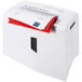 A white HSM ShredStar X8 paper shredder with red paper in it.