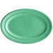 A green oval platter with a white background.