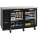 A Turbo Air back bar cooler with glass doors filled with bottles of beer.