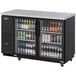 A black Turbo Air back bar cooler with glass doors.