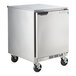 A stainless steel Beverage-Air undercounter refrigerator with wheels.