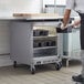 a person opening a refrigerator