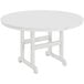A POLYWOOD white round dining table with legs.