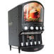 A Grindmaster powdered specialty beverage dispenser with cappuccino in a cup.