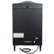 A black Grindmaster powdered beverage dispenser with a wire attached.