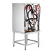 A Noble Warewashing high temperature undercounter dishwasher with pipes and hoses.