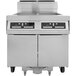 A Dean PowerRunner liquid propane floor fryer with two 50 lb. frypots.