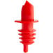 A red plastic liquor pourer with a screw top.