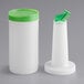 A white container with a green lid.