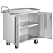 A Regency stainless steel utility cart with two open doors.