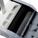 A Namco Floorwash 5000 walk behind cylindrical floor scrubber with a handle.