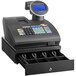 A Royal Alpha black cash register with a drawer and keyboard on a counter.