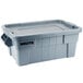 A grey Rubbermaid Brute plastic tote with a lid.