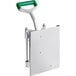 A metal plate with a green and metal wall-mounted Garde potato wedger.