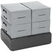 A stack of four black IRP Case Stackers on top of each other.