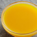 A glass bowl of Les Vergers Boiron Tropical Fruits 100% Fruit Puree.