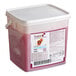 A white plastic container of Les Vergers Boiron Blood Orange 100% Fruit Puree with a white lid.