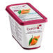 A container of yogurt with Les Vergers Boiron Corsican Clementine fruit puree on top.